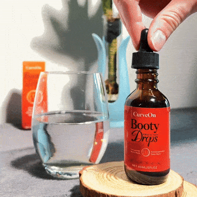 Adding CurveOn drops to a glass of water